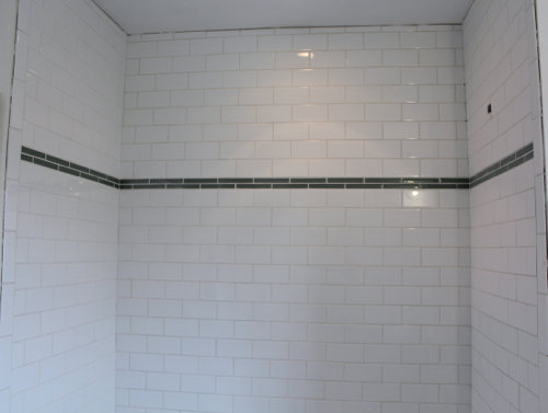 shower surround grouted and looking MUCH darker than in does in person.
