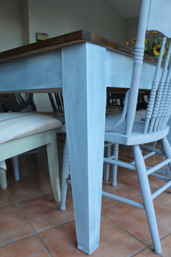 "Slate" milk paint with a white glaze on the frame. Gray spray paint for the chairs.